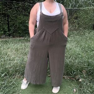 Arula size A olive green overalls jumpsuit with front buttons and pockets
